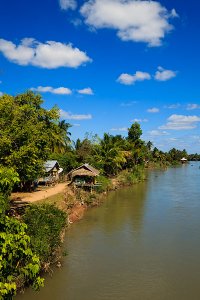 Guesthouses and restaurants on the banks of the Mekong River, located on Don Det Island which forms part of the Four Thousand Islands, known locally as Si Phan Don.