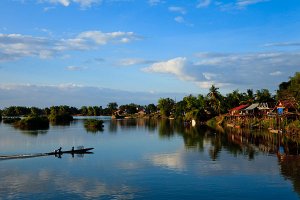 Guesthouses and restaurants on the banks of the Mekong River, located on Don Det Island which forms part of the Four Thousand Islands, known locally as Si Phan Don.