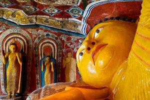 Reclining Buddha statue inside the second century B.C. Mulkirigala Raja Maha Viharaya, known locally as Little Sigiriya, located roughly 20km from Tangalle.