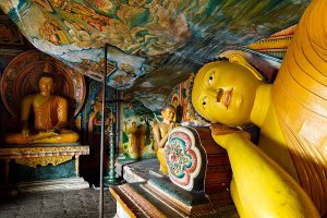 Reclining Buddha statue inside the second century B.C. Mulkirigala Raja Maha Viharaya, known locally as Little Sigiriya, located roughly 20km from Tangalle.