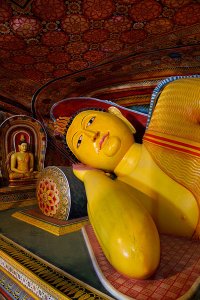 Reclining Buddha statue inside the second century B.C. Mulkirigala Raja Maha Viharaya, known locally as Little Sigiriya, located roughly 20km from Tangalle.