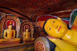 Reclining Buddha statue inside the second century B.C. Mulkirigala Raja Maha Viharaya, known locally as Little Sigiriya, located roughly 20km from Tangalle.