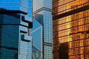 A close up view of the Far East Finance Centre, the Lippo Centre, the Bank of China and the ICBC Tower, all located in the Central district of Hong Kong Island.
