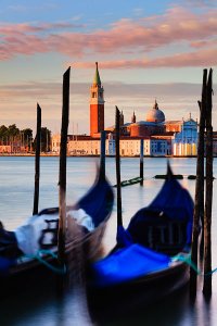 View across the Bacino di San Marco lagoon towards San Giorgio Maggiore, as seen from the Gondola station near Piazza San Marco, also known as St. Mark's Square, located in the UNESCO World Heritage Site of Venice.